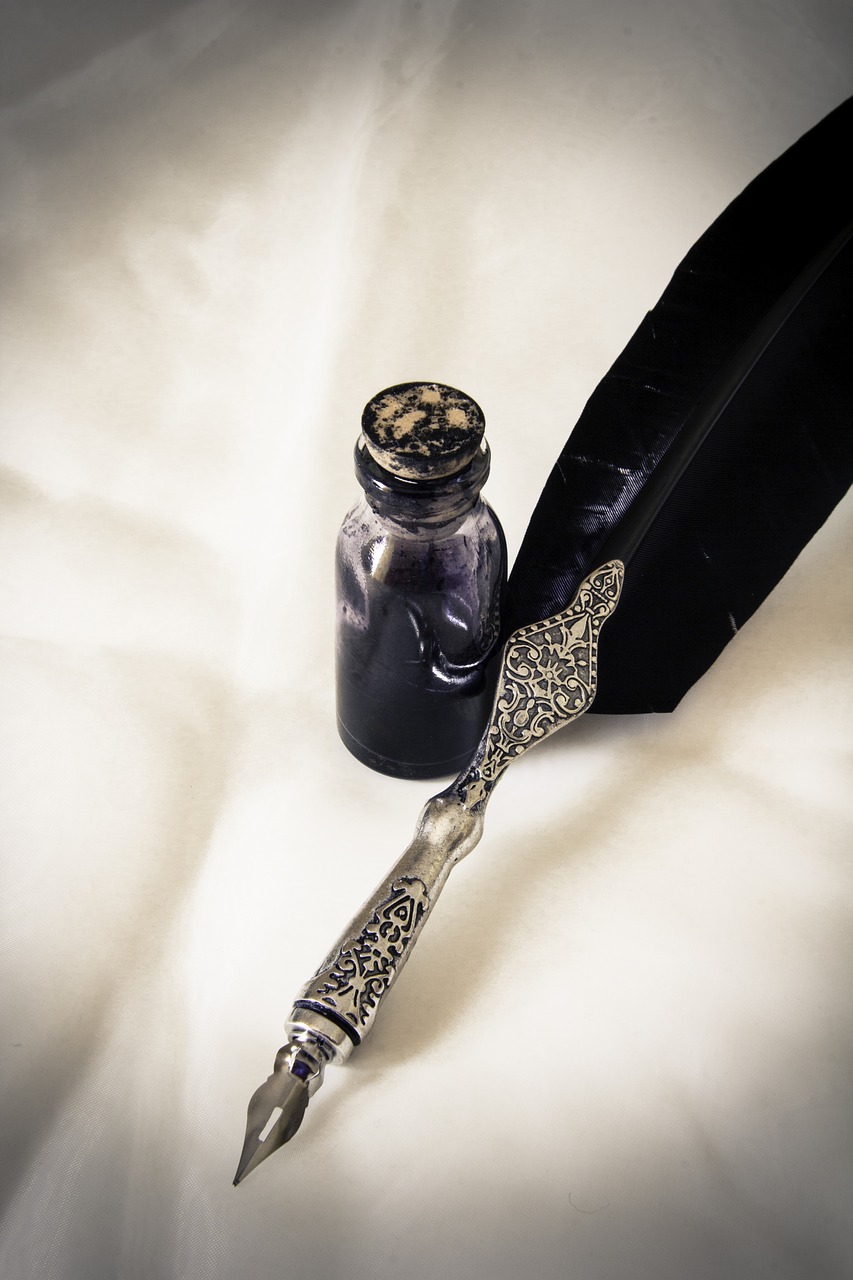 Quill and ink in a bottle.